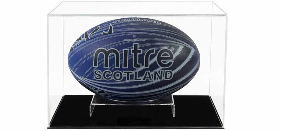 Clear Acrylic Display Cover on a Black plain acrylic base with a white background, There is a blue rugby ball displayed inside the display case.