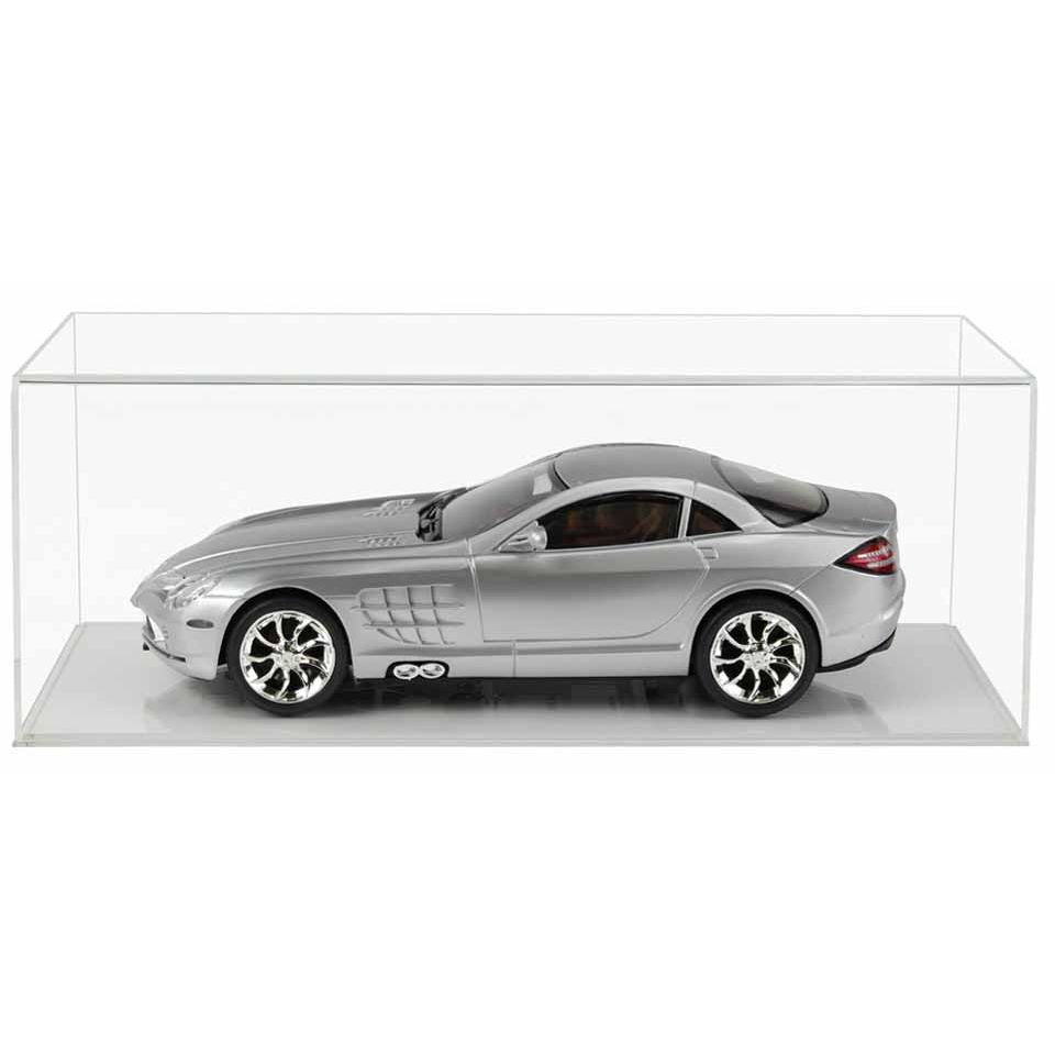 Clear Acrylic Display Cover on a clear plain acrylic base with a white background, There is a grey 1:12 scale model car displayed inside the display case.